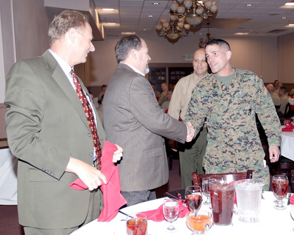 Gen. Nally greets industry representatives who attended the February luncheon.